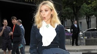 OOPS! Elizabeth Olsen Channels Marilyn Monroe with a Wardrobe Malfunction at Paris Fashion Week!