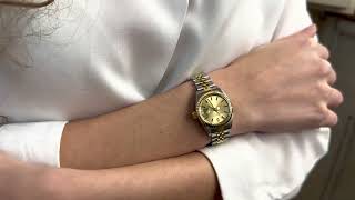 Vidéo: Montre Rolex Oyster Date Dame Or & Acier de 1976. Cadran jaune. Ref : 6917 de 1976.