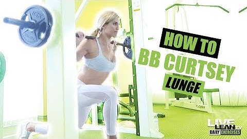 How To Do A BARBELL CURTSEY LUNGE | Exercise Demonstration Video and Guide