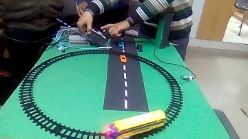 Automatic Railway Gate Crossing Barrier Using P.L.C.(programmable logic controller)