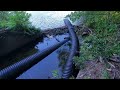 Unclogging Culverts Along Access Road Leading To Abandoned Dam