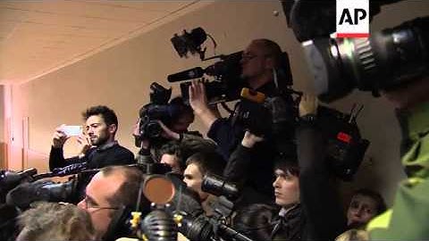 Defendants arrive in case of acid attack on artistic director