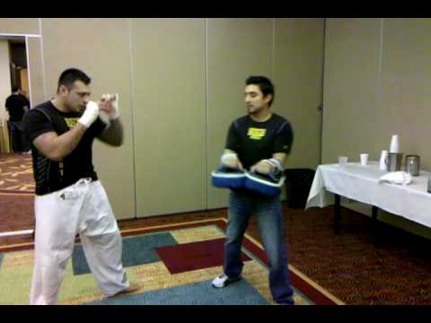 Saul Aguilar and coach Neil Rocha pre-fight warm up
