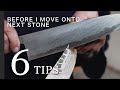 How professional sharpener decide when to move onto the next stone on edge sharpening  