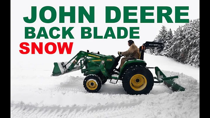 John Deere 3025E Tractor BACK BLADING SNOW!