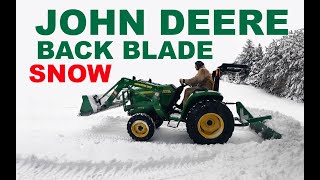 John Deere 3025E Tractor BACK BLADING SNOW!