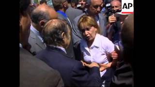 President confronted by angry quake victims while visiting epicentre