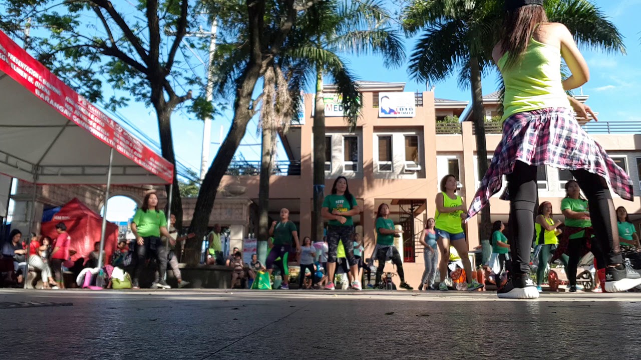 Zumbaranggay in green 4 dancing in the street