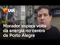 Com recuo em enchente, morador espera volta da energia em Porto Alegre