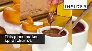 This place makes spiral churros and then dips them in chocolate