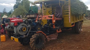 Xe công nông cầu đẩy của gara đông xuân chở lúa vs xe phun lúa...