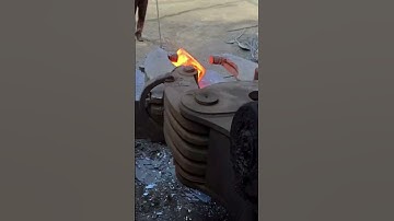 Forging a rectangular iron block at high temperature of 1000 degrees Celsius!