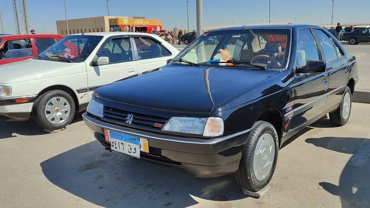 بيجو 405 مصروف عليها كتير اووي موديل 94