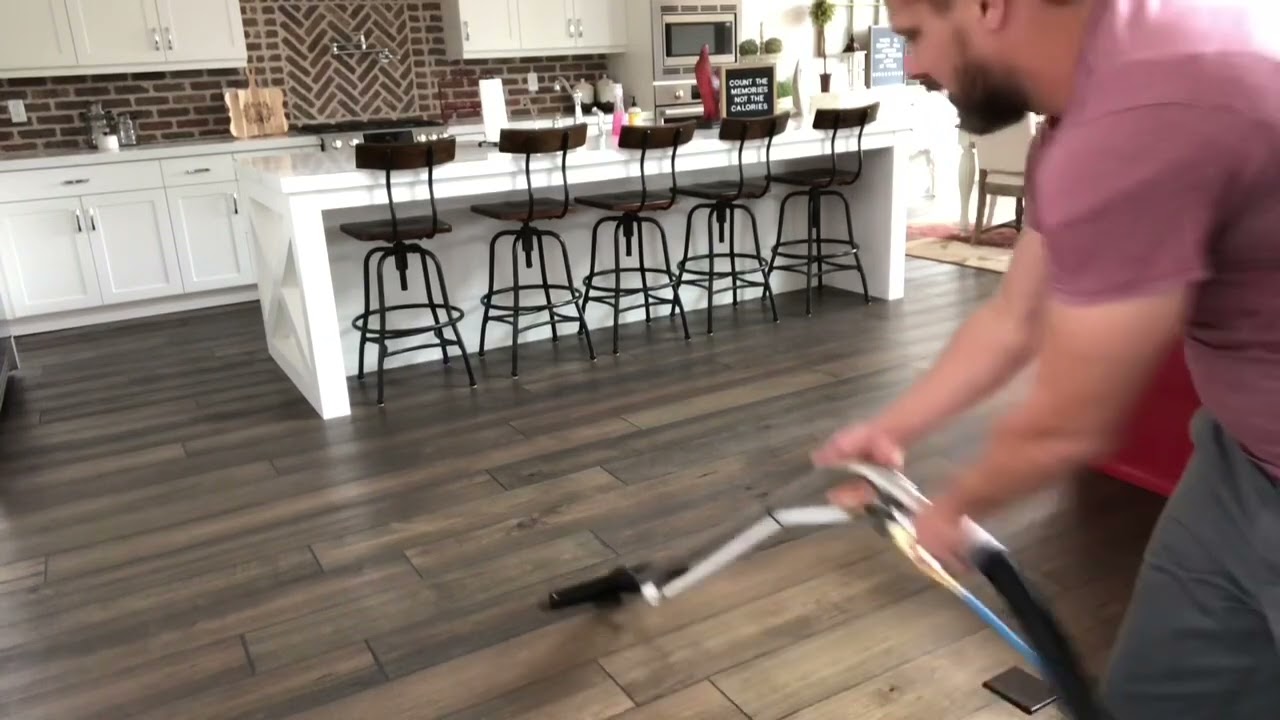 Aqua-Air cleaning hard floors in a home
