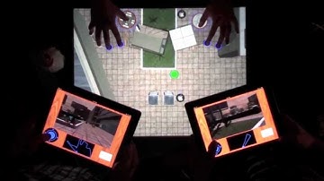 Collaborative Control of Simulated Robots Using Microsoft Surface & Apple iPad