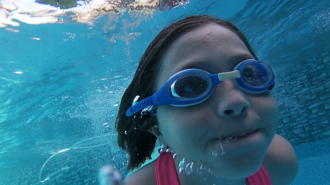 Logan going down the slide!