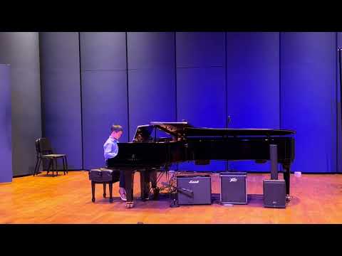 9-Year-Old Piano Prodigy: Stunning Rush E Recital Performance!