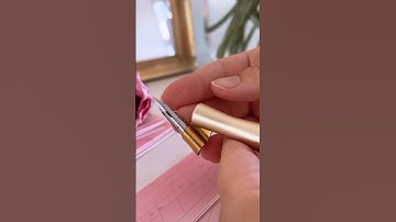 Art process. Copperplate calligraphy on watercolor background. How to write beautiful names?