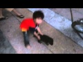 James imran is playing with german shaped puppy