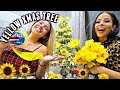 making a yellow sunflower christmas tree with amber scholl! | vlogmas day 13