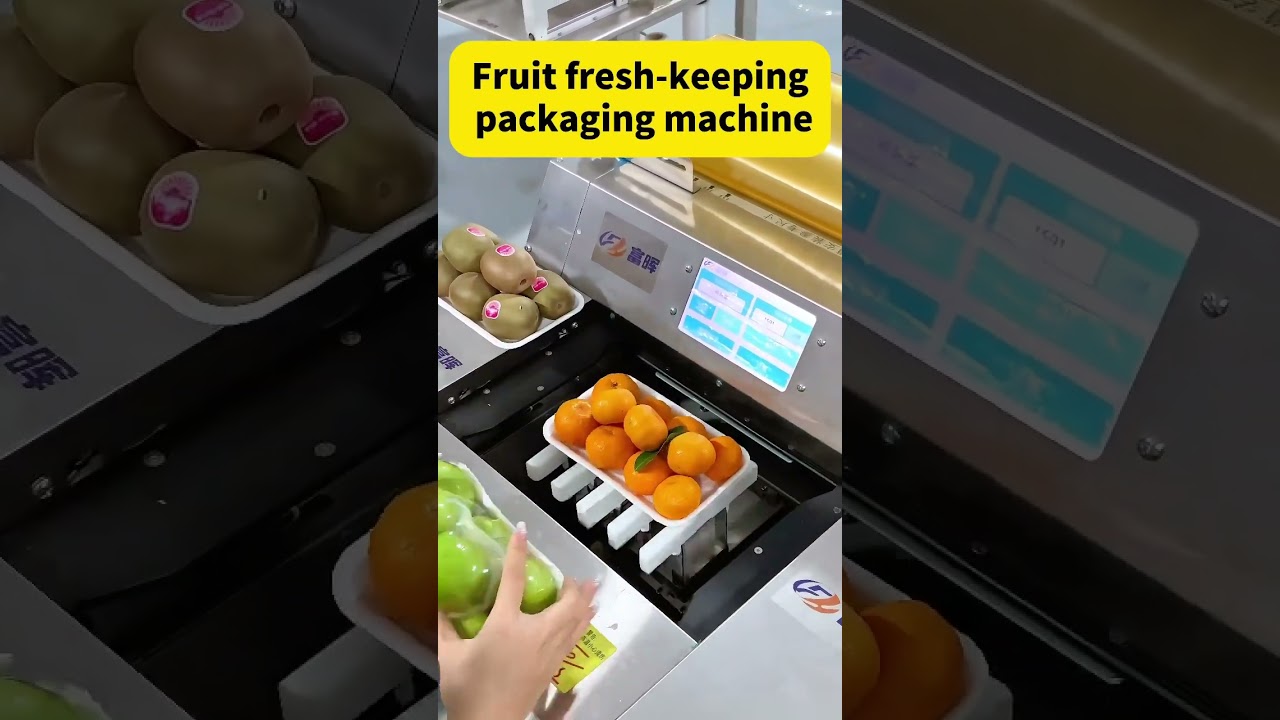 Fresh Fruits Cling Film Packaging Machine. 