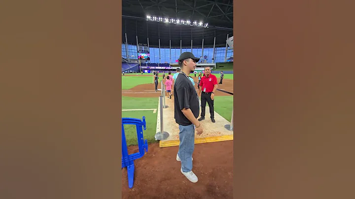 The kids running the bases at the Florida Marlins Field.
