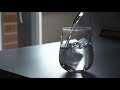 Pouring water in a glass