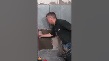 How to cut tiles around the corner of a bath with Craig Phillips! #shorts