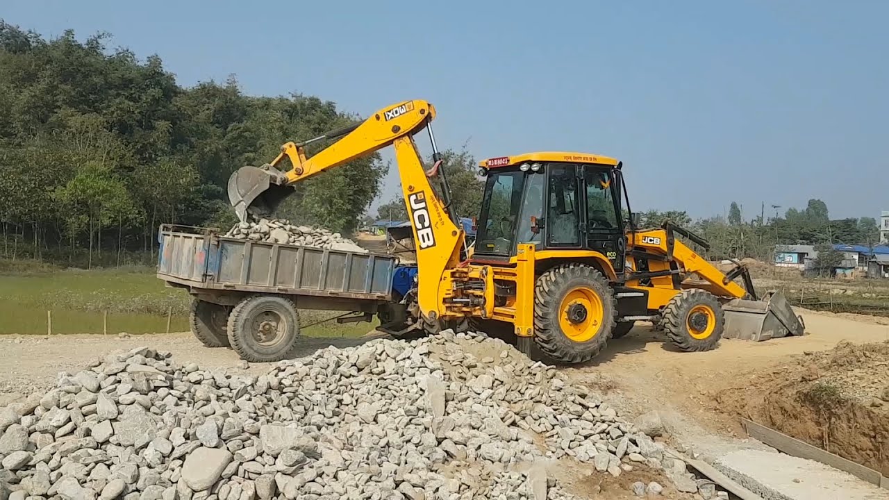 JCB Backhoe Loader Loading Stone in Tractor - Tractor Carrying Stone - JCB Working Video