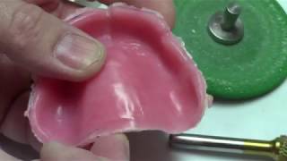 Finishing a complete denture for polishing