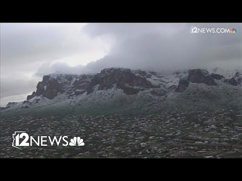 Superstition Mountains covered in snow after winter storm