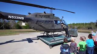University Academy kindergartners take a tour of the Bay County Emergency Operations Center in...