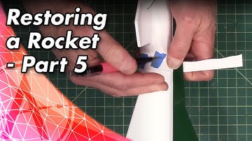 Masking a circumference line around a model rocket tube for painting
