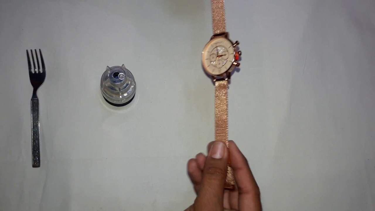 How to adjust a watch clasp on a metal mesh strap? - YouTube