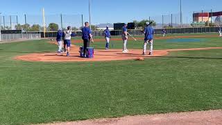 Cubs coaches hitting to players in the infield -- Chicago Cubs Spring Training 2024