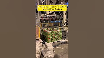 Palletizing robot in operation in a fertilizer factory.