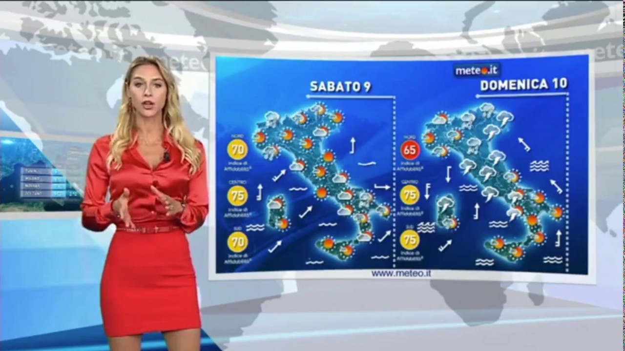 Italian Meteorologist in red satin blouse and red skirt ...