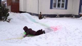 Ruby Rides Her Rainbow Toboggan Slide