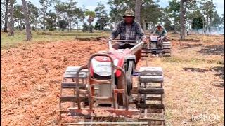 M269, Team small tractor Kubota plowing