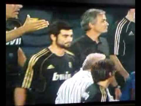 Jose Mourinho poking Tito Vilanova in the eye