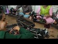 गुरु नानक सिलाई सेंटर   में  सिलाई मशीनों  की  सफाई हो रही हैं