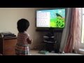 Lil girl in UK enjoying Gujarati Learning through EVidyalay's videos