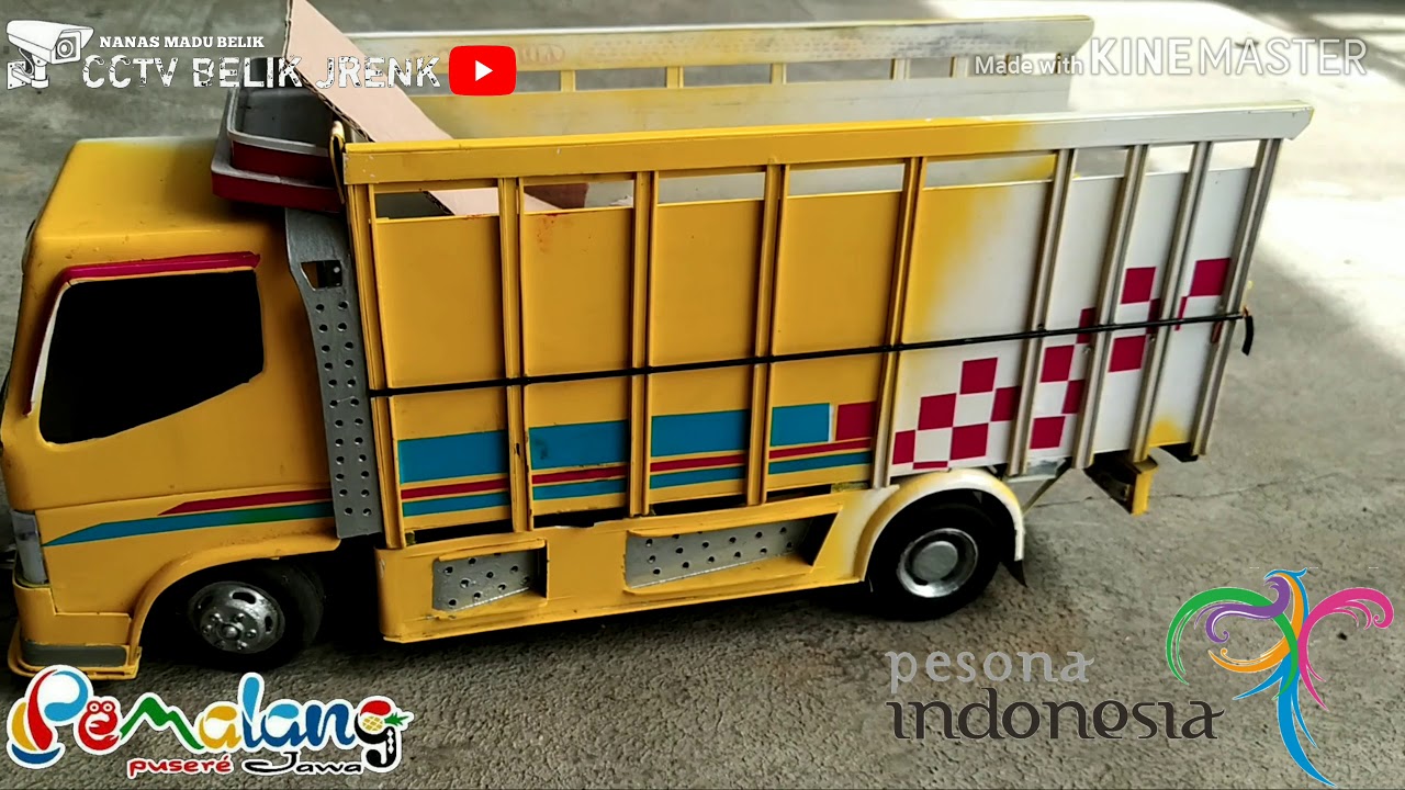 Miniatur truk  scania vs  canter  modifan biasa balapan 