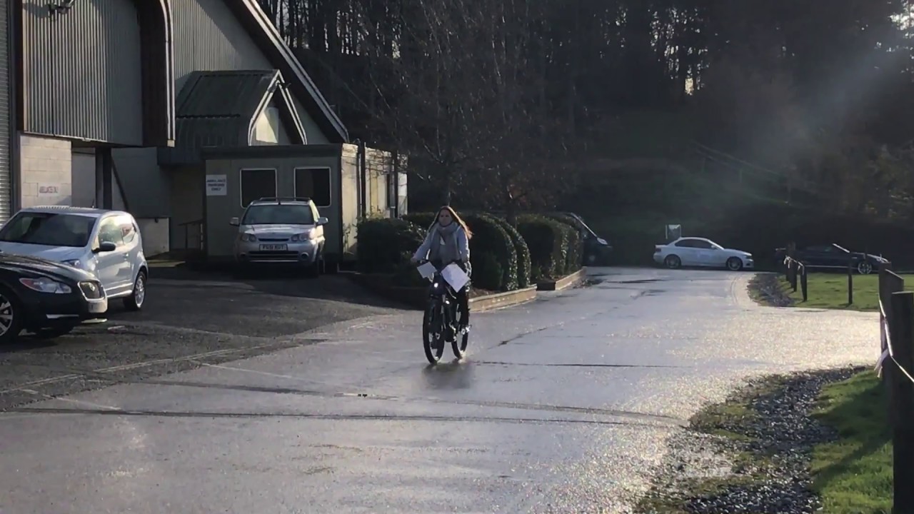 Tania test riding the Riese & Muller Charger electric bike at The Motorhome Show in Exeter, Devon