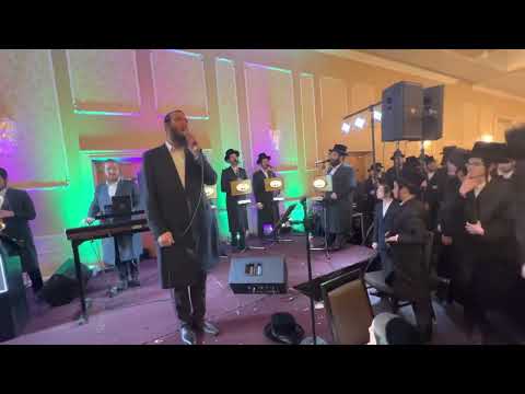 Beri waber singer Avrum david lunger on keys with Yedidim choir