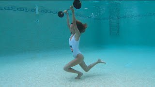 Carla Underwater Fitness training with weights underwater