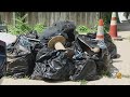 Residents Clean Up Debris From Recent Floods