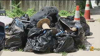 Residents Clean Up Debris From Recent Floods