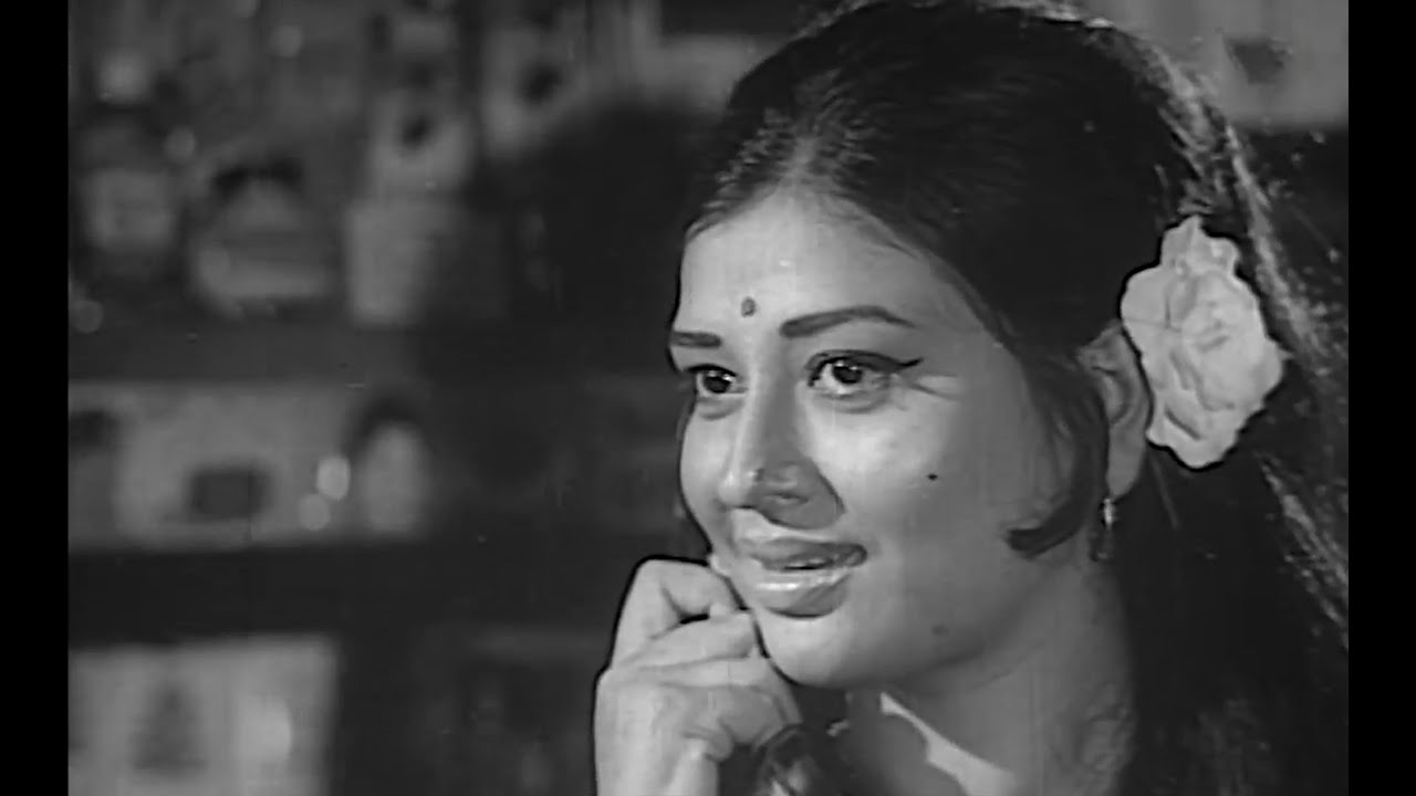 Aynate Oi Mukh Dekhbe Jokhon
