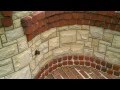 Stone/Brick fireplace with brick oven and BBQ designed and erected by Josh Link